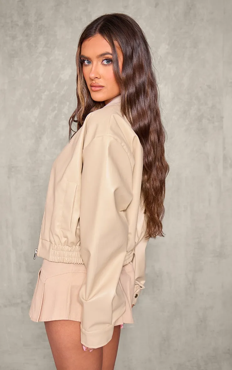 Bomber en PU taupe