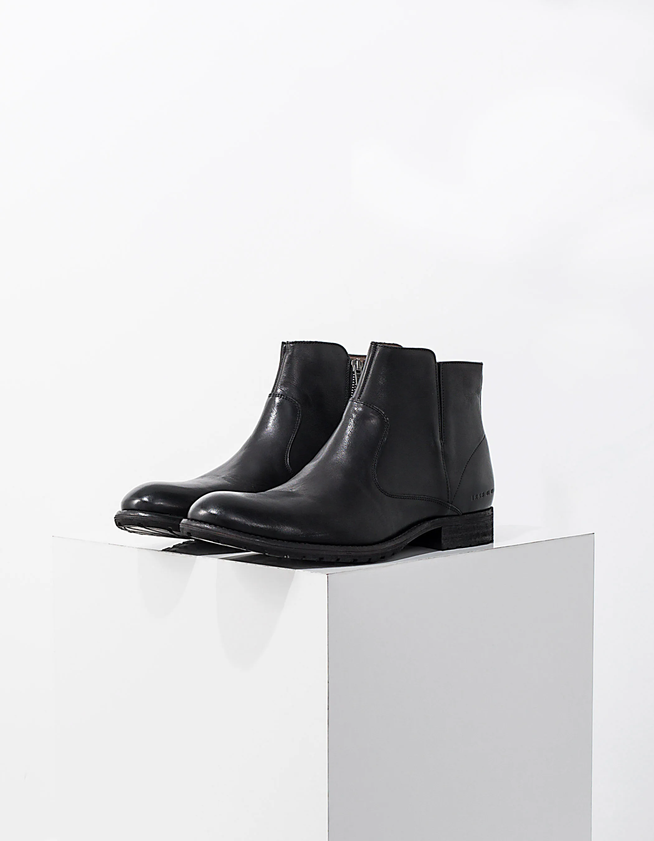 Boots noirs en cuir Homme