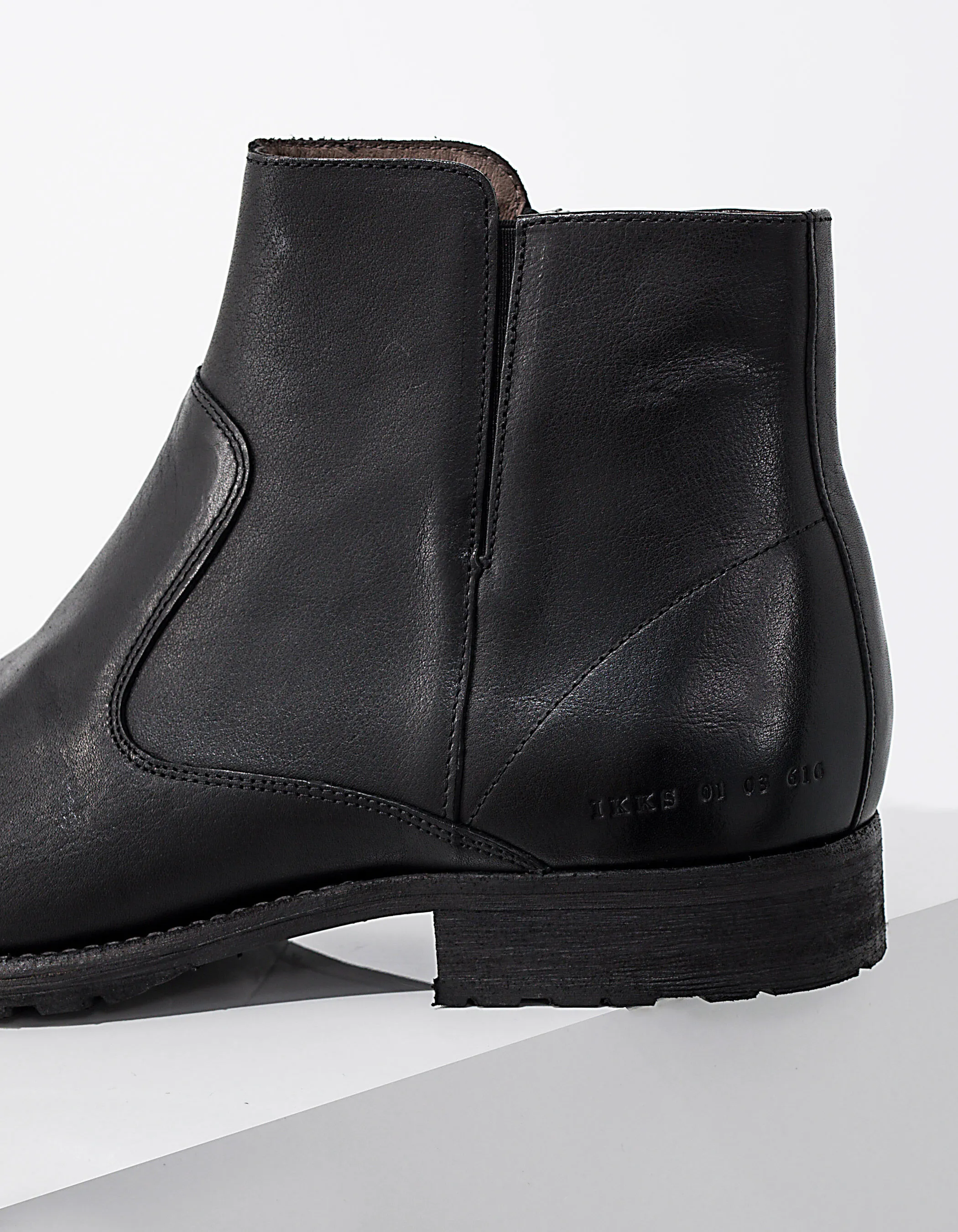 Boots noirs en cuir Homme