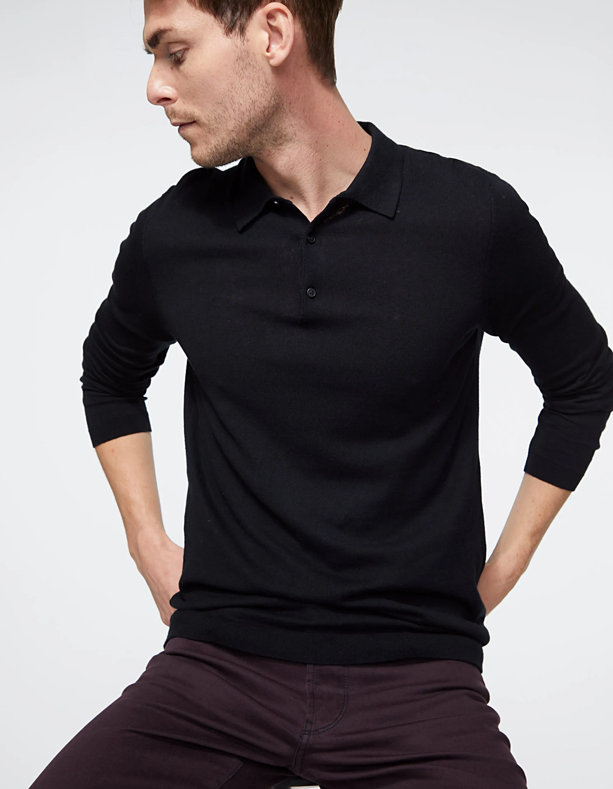 Polo noir en tricot manches longues Homme