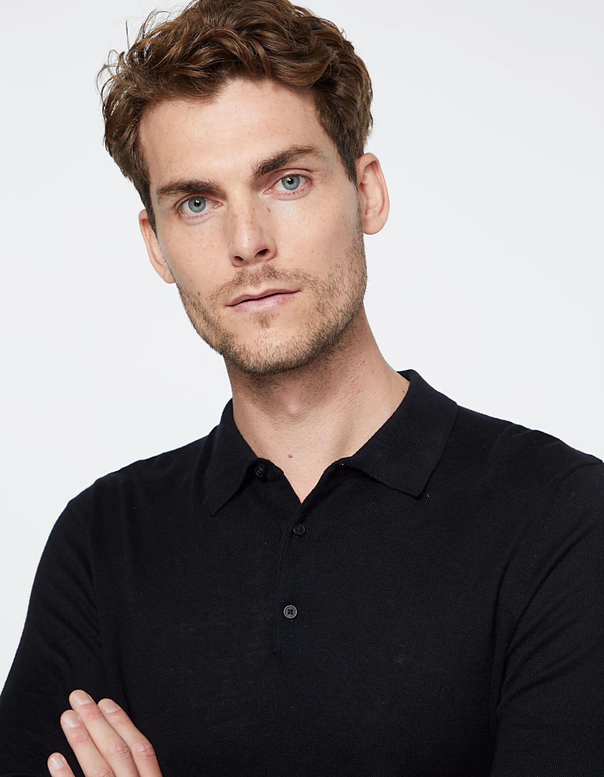 Polo noir en tricot manches longues Homme